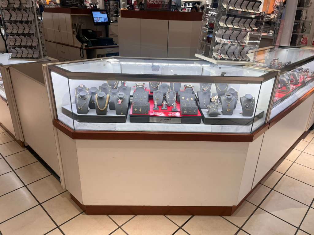 Interior mirrors adjacent to bath glass.