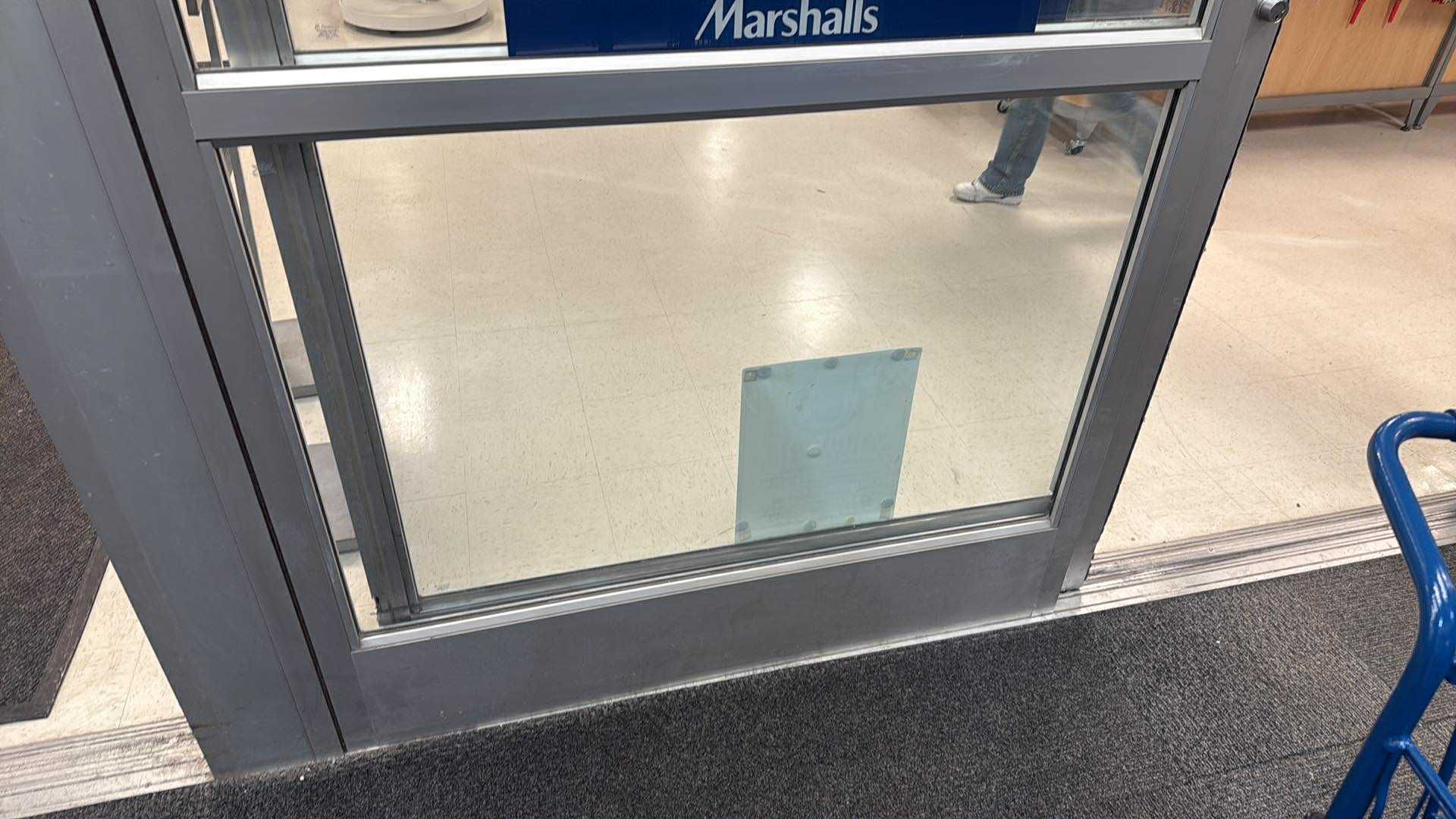 Commercial storefront door glass.